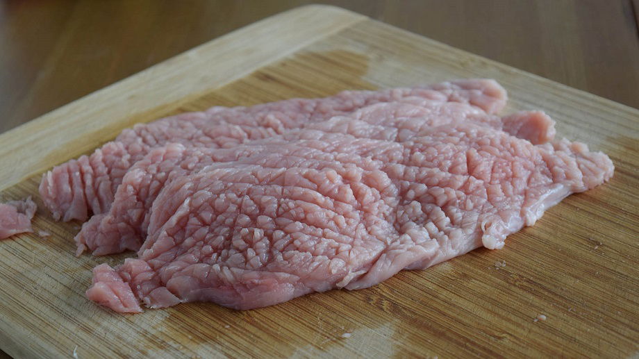 Pound schnitzel until thin